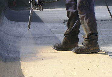 coating systems over Topeka spray foam roof systems